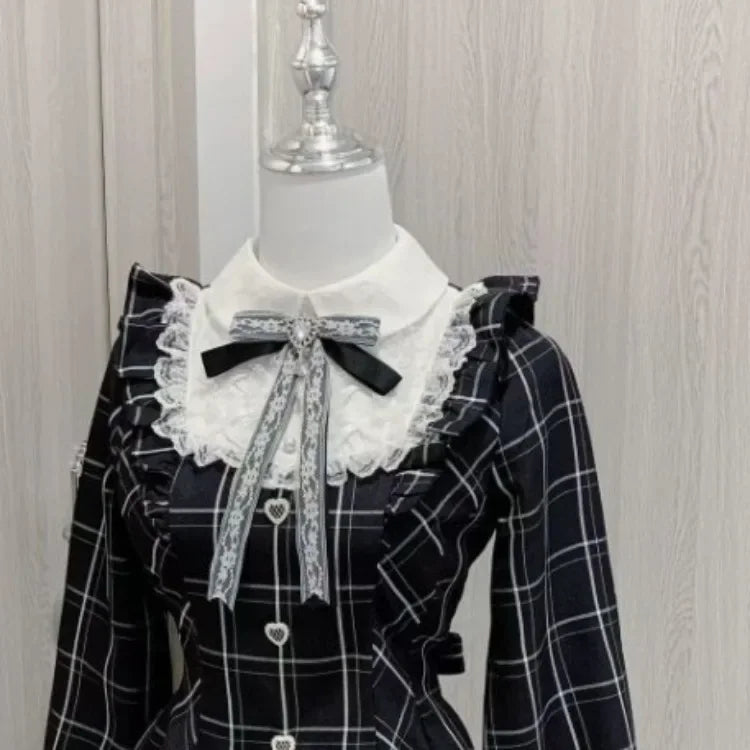 Robes à carreaux noirs avec nœud doux